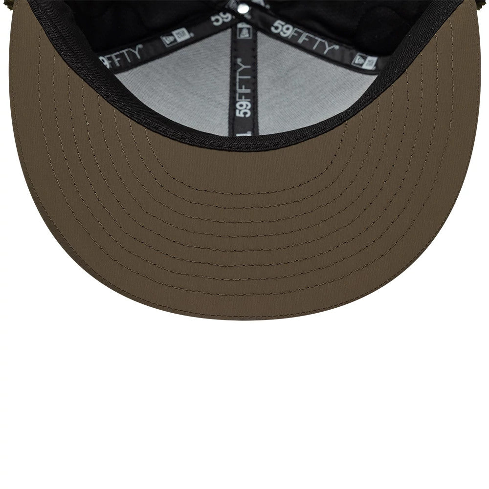 Pictured is this New Era Quilted Dogear 59FIFTY Fitted cap in Dark Green. 9