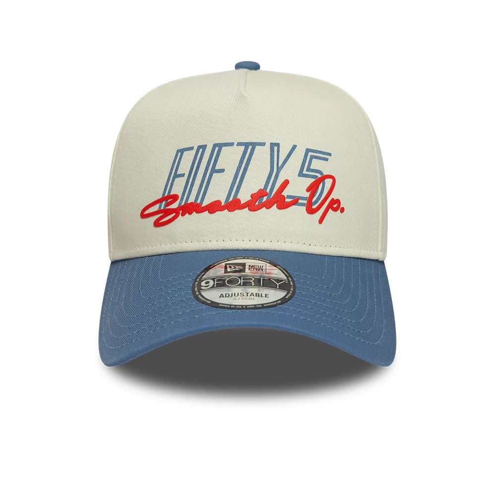 Carlos Sainz Team Fifty5 Contrast Visor Cream New Era 9FORTY A-Frame Adjustable Cap, front view showing blue embroidered Fifty5 text and red Op. script on the structured cream crown, with a blue curved visor and 9FORTY size sticker.