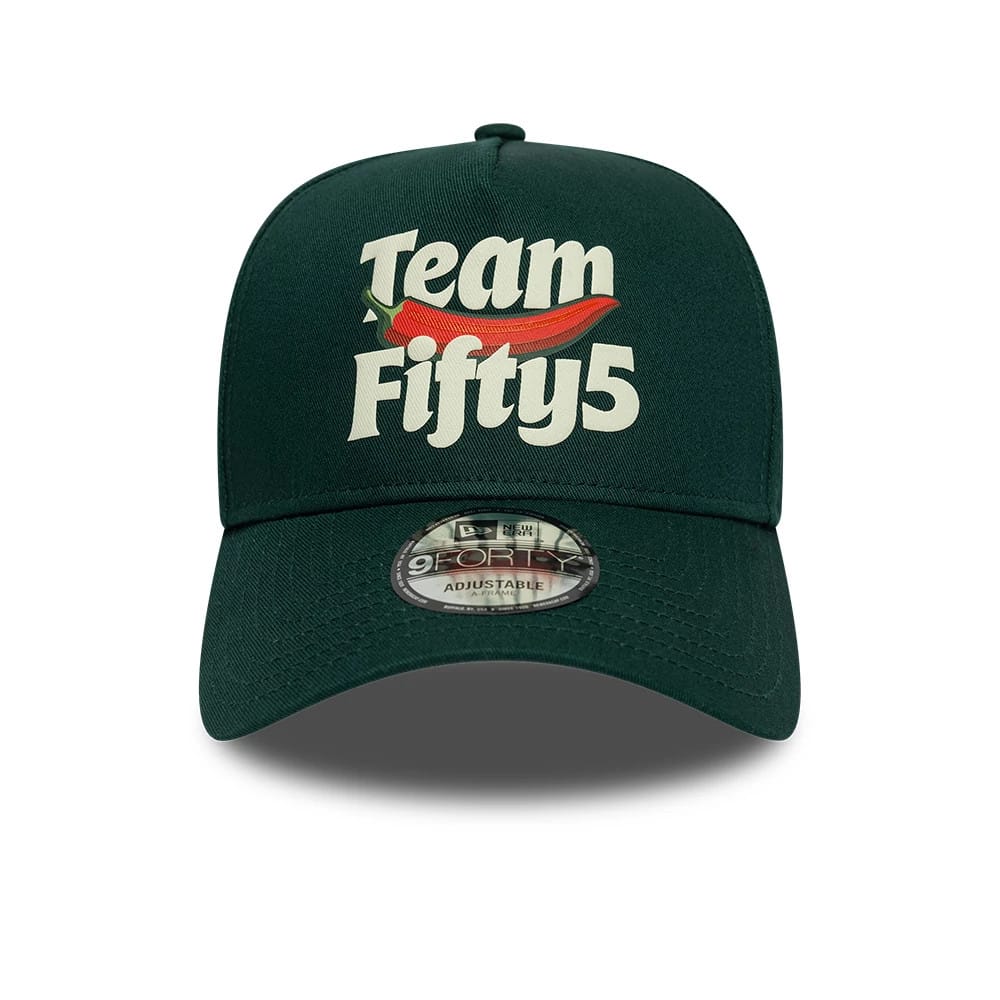 Carlos Sainz Team Fifty5 Puff Print Dark Green New Era 9FORTY A-Frame Adjustable Cap, front view showing a raised Team Fifty5 logo with a red chilli graphic on the structured crown, with a 9FORTY size sticker on the curved visor.