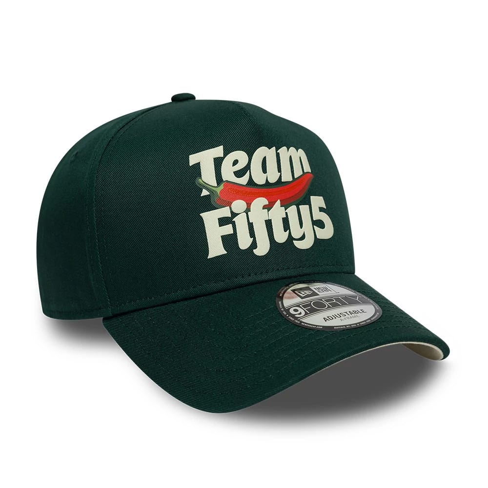 Carlos Sainz Team Fifty5 Puff Print Dark Green New Era 9FORTY A-Frame Adjustable Cap, three-quarter view showing a white Team Fifty5 puff print with a red chili graphic on the front, curved dark green visor and 9FORTY size sticker.