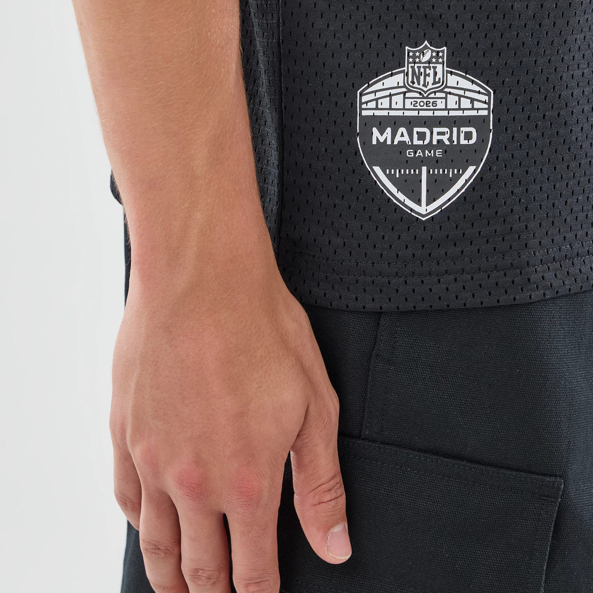 The model is wearing this NFL International Series Games 2026 Graphic Atlanta Falcons Mesh Jersey in black. 7