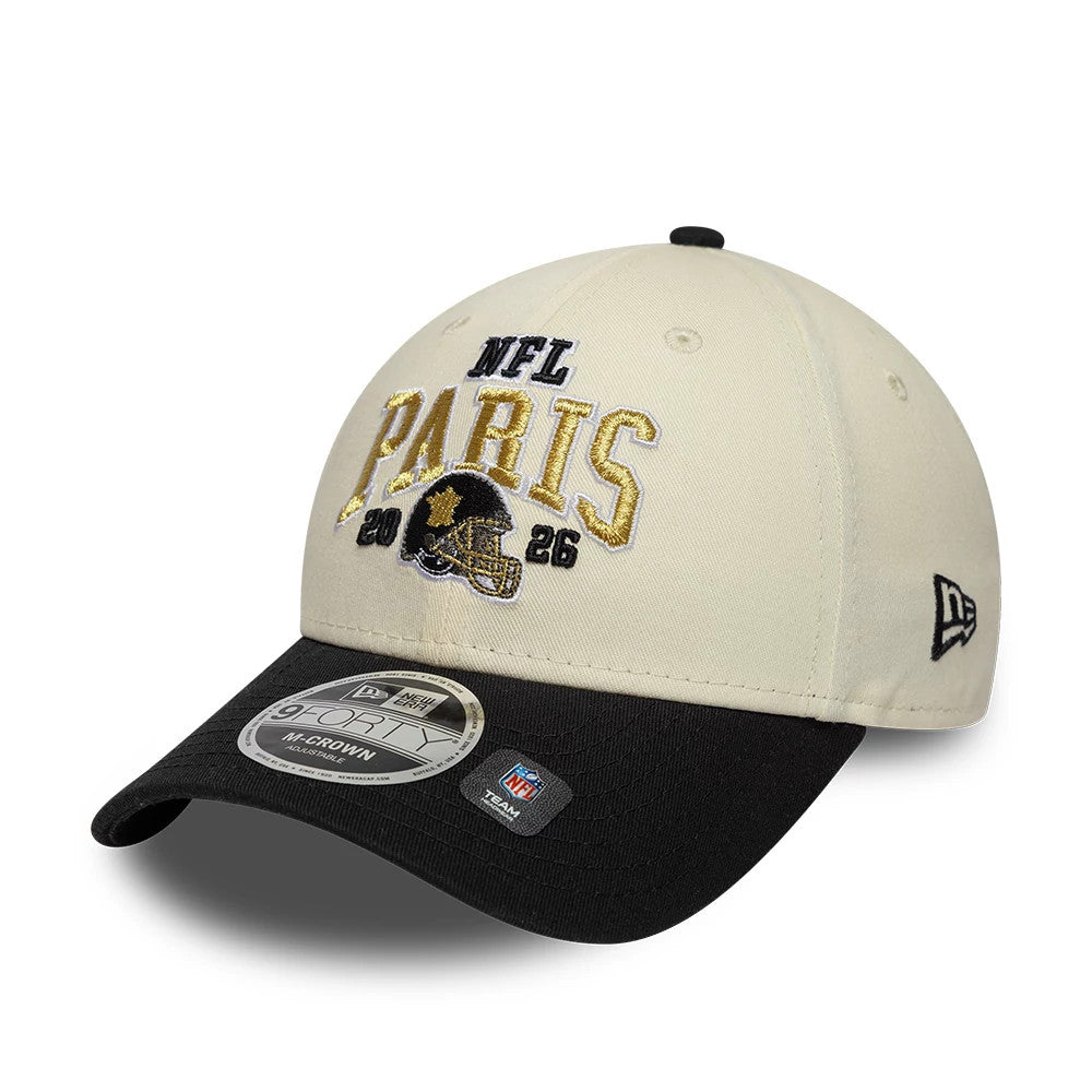 Saints NFL International Games 2026 Paris White & Black New Era 9FORTY M-Crown Adjustable Cap, front view showing gold and black embroidered NFL Paris 2026 logo on the structured white crown, with a black curved visor and 9FORTY size sticker.