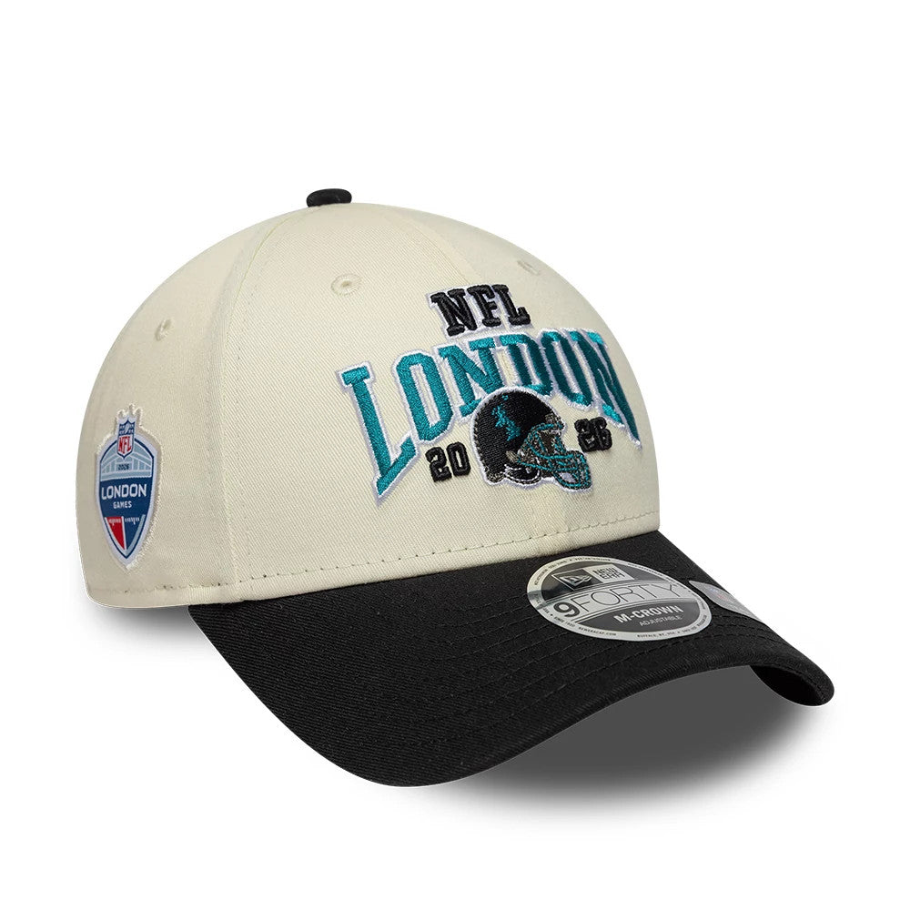 Jaguars NFL International Games 2026 London White & Black New Era 9FORTY M-Crown Adjustable Cap, front view showing the teal and black embroidered NFL London logo with a helmet on the front panels, black curved visor and 9FORTY size sticker.