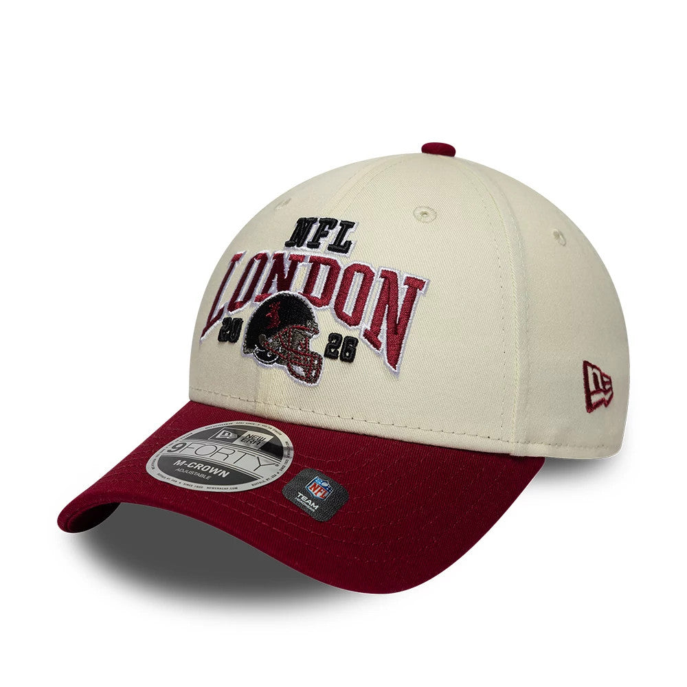 Commanders NFL International Games 2026 London White & Dark Red New Era 9FORTY M-Crown Adjustable Cap, three-quarter view showing the raised black and dark red embroidered NFL London 2026 graphic on the front panel, dark red visor.