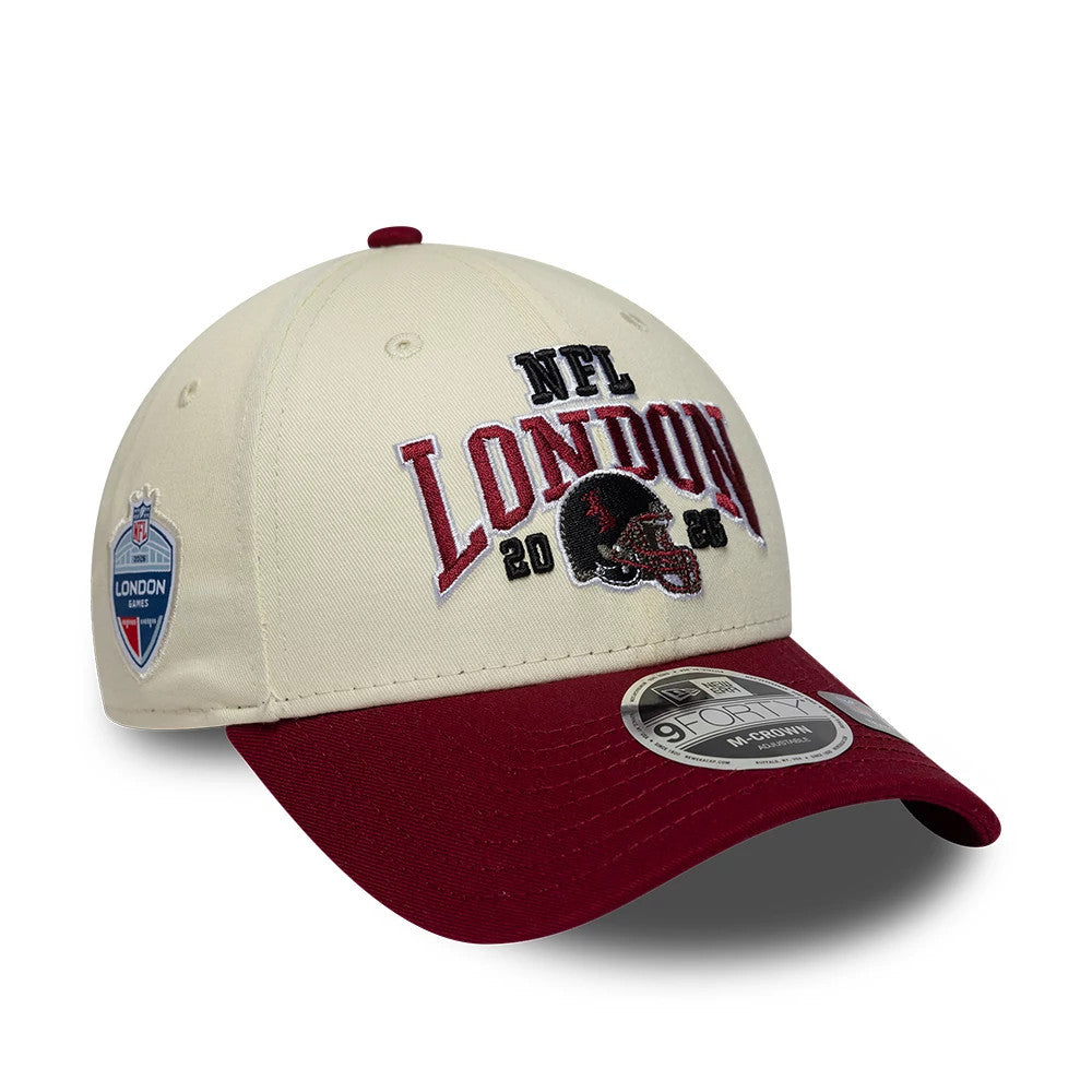 Commanders NFL International Games 2026 London White & Dark Red New Era 9FORTY M-Crown Adjustable Cap, front view showing white, red, and black embroidered NFL London 2026 logo on cream front panels.