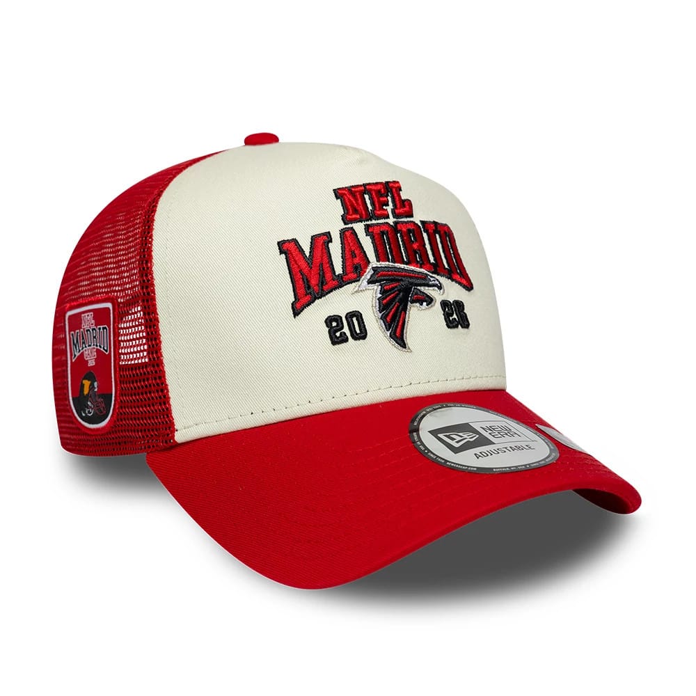 Falcons NFL International Games 2026 Madrid Red New Era 9FORTY A-Frame Trucker Adjustable Cap, front view showing the red, white, and black embroidered NFL Madrid logo on the cream front panel, red visor with a 9FORTY size sticker.