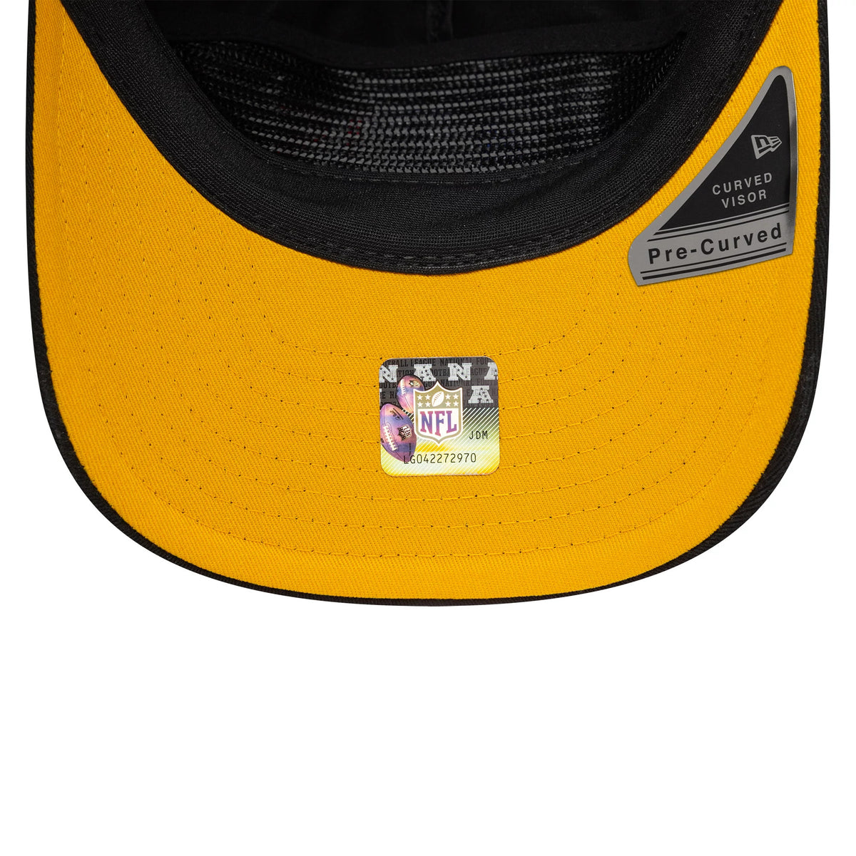 Pittsburgh Steelers NFL International Games 2026 Paris Black New Era 19TWENTY Adjustable Cap, inside view showing a black sweatband, yellow undervisor with an NFL holographic sticker, and curved visor with a Pre-Curved label on the right side.