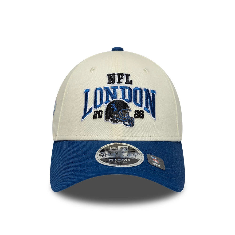 Colts NFL International Games 2026 London White & Blue New Era 9FORTY M-Crown Adjustable Cap, front view showing the blue and black embroidered NFL London 2026 graphic on the white crown, with a curved blue visor and 9FORTY size sticker.
