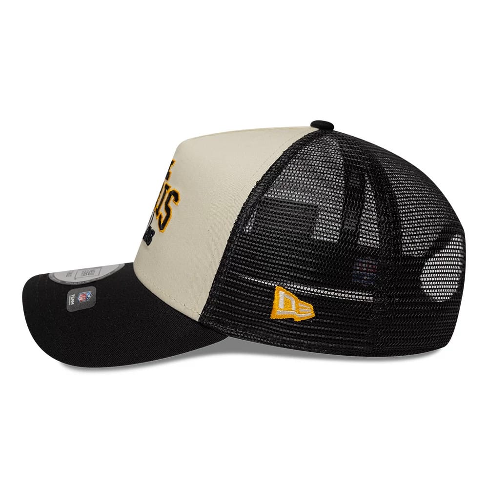 Steelers NFL International Games 2026 Paris Black New Era 9FORTY A-Frame Trucker Adjustable Cap, side view showing a yellow embroidered New Era flag logo on the black mesh, a curved black visor and structured front with a 9FORTY size sticker.
