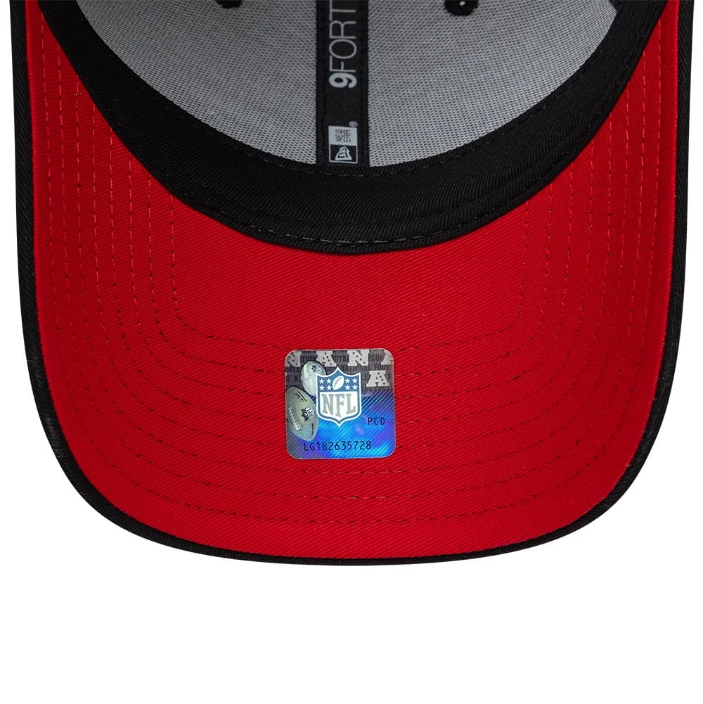 Houston Texans NFL International Games 2026 London Black New Era 9FORTY Adjustable Cap, inside view showing the grey fabric and black taping across the crown, a bright red undervisor with a prominent holographic NFL authenticity sticker.