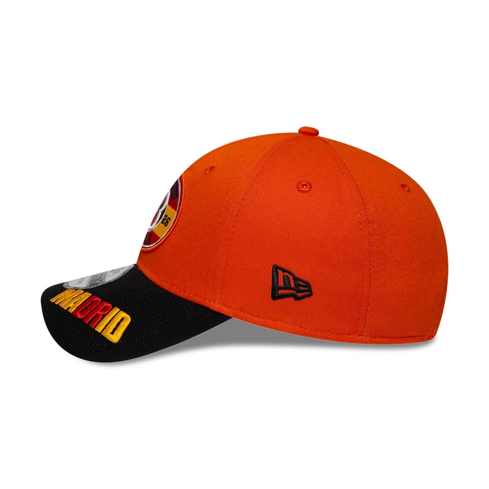 Bengals NFL International Games 2026 Madrid Orange & Black New Era 9FORTY Adjustable Cap, side view showcasing the black embroidered New Era flag logo on the left side, orange structured crown with matching top button, and black visor.