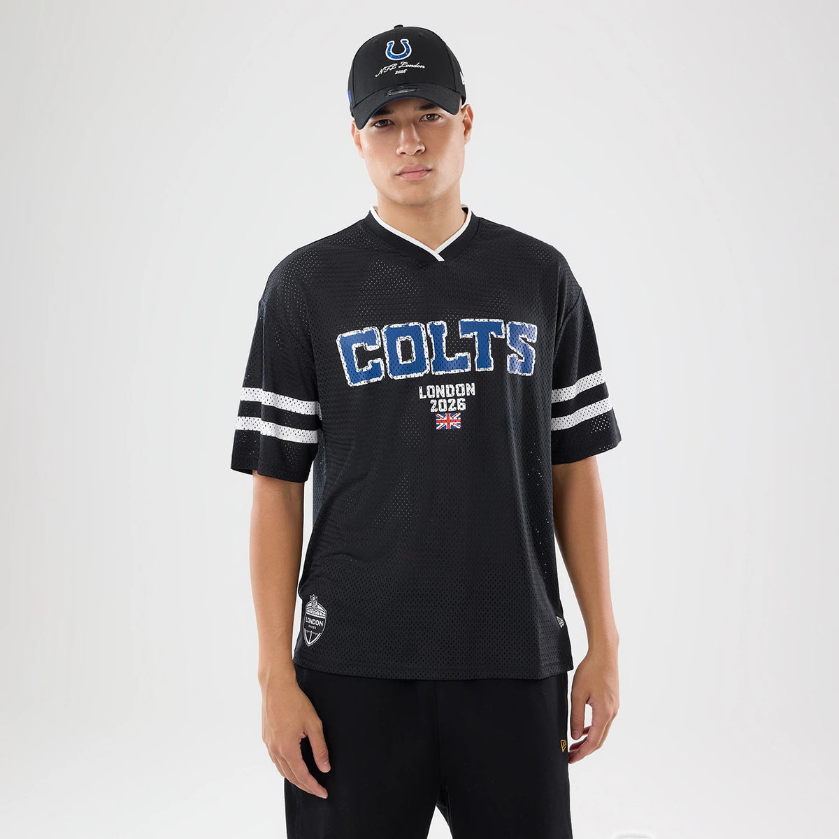 The model is wearing this NFL International Games 2026 Indianapolis Colts Mesh Jersey in black. 1