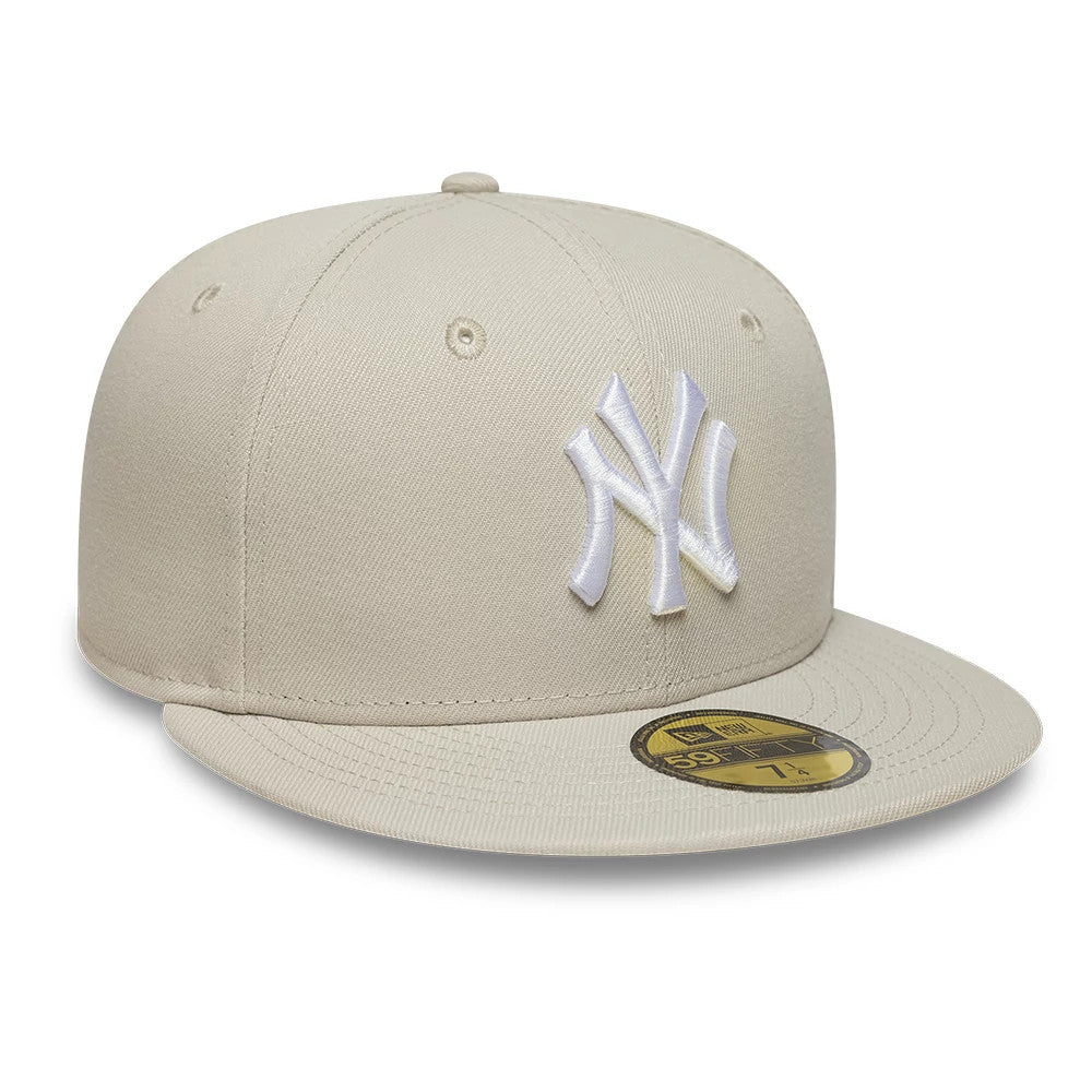 New York Yankees MLB Light Beige New Era 59FIFTY Fitted Cap, front view showing the white raised embroidered NY logo on the front panel, a structured light beige crown with matching flat visor, and a gold 59FIFTY size sticker on the visor.
