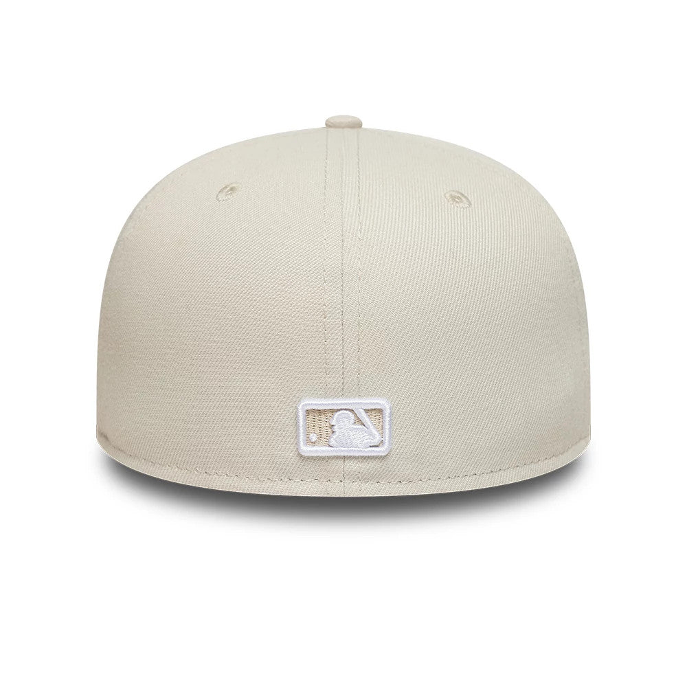 Pictured is this MLB New York Yankees 59FIFTY Fitted cap in light beige. 4