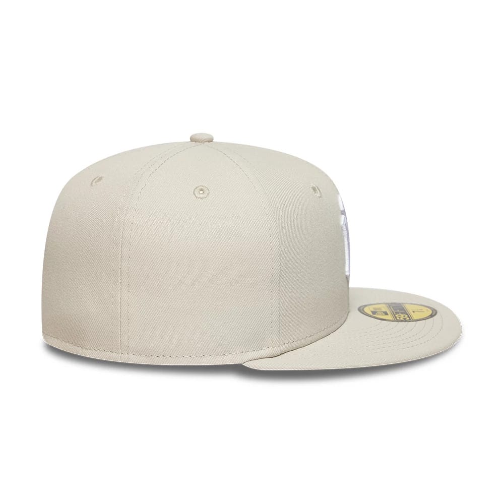Pictured is this MLB New York Yankees 59FIFTY Fitted cap in light beige. 7