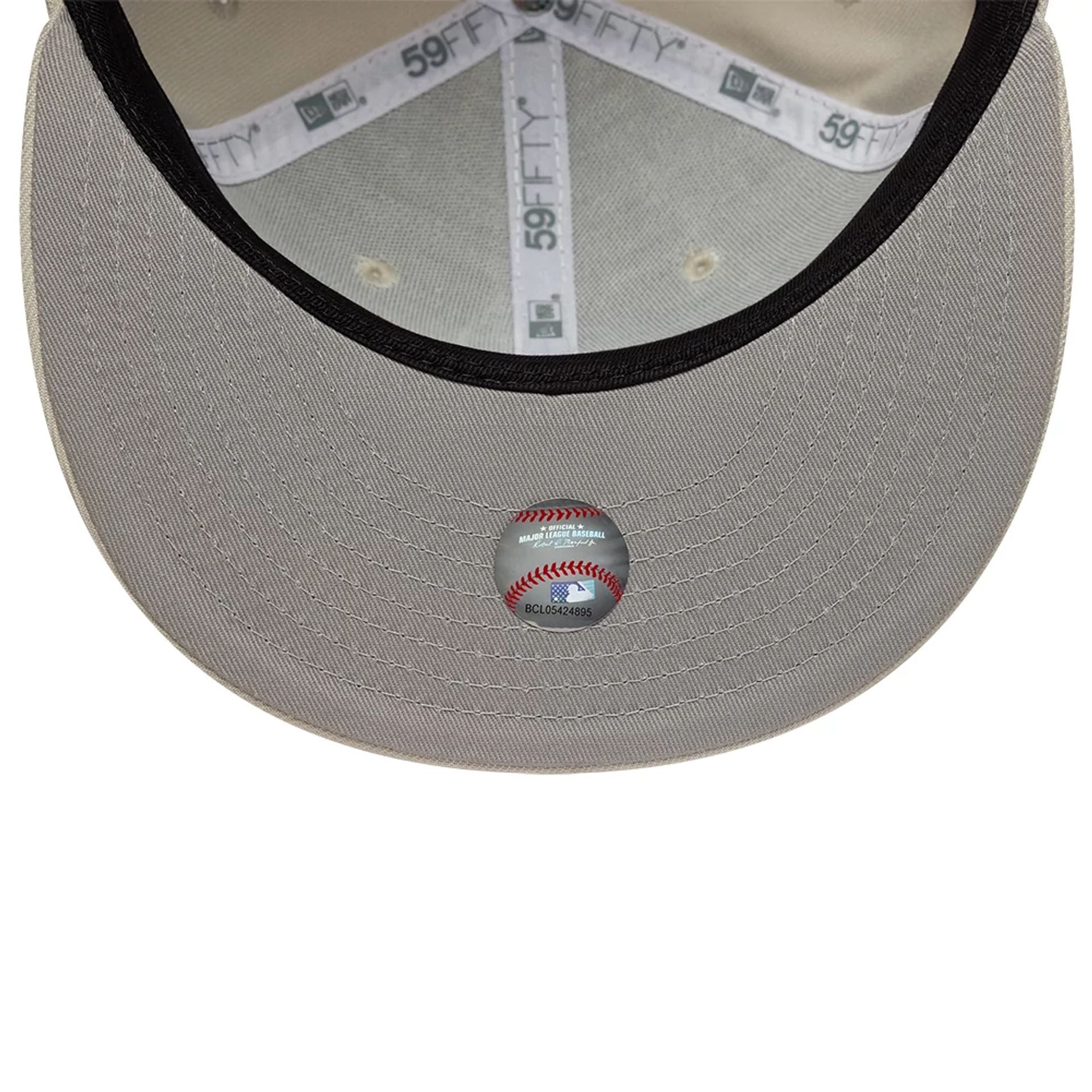 Pictured is this MLB Chicago White Sox 59FIFTY Fitted cap in beige. 2