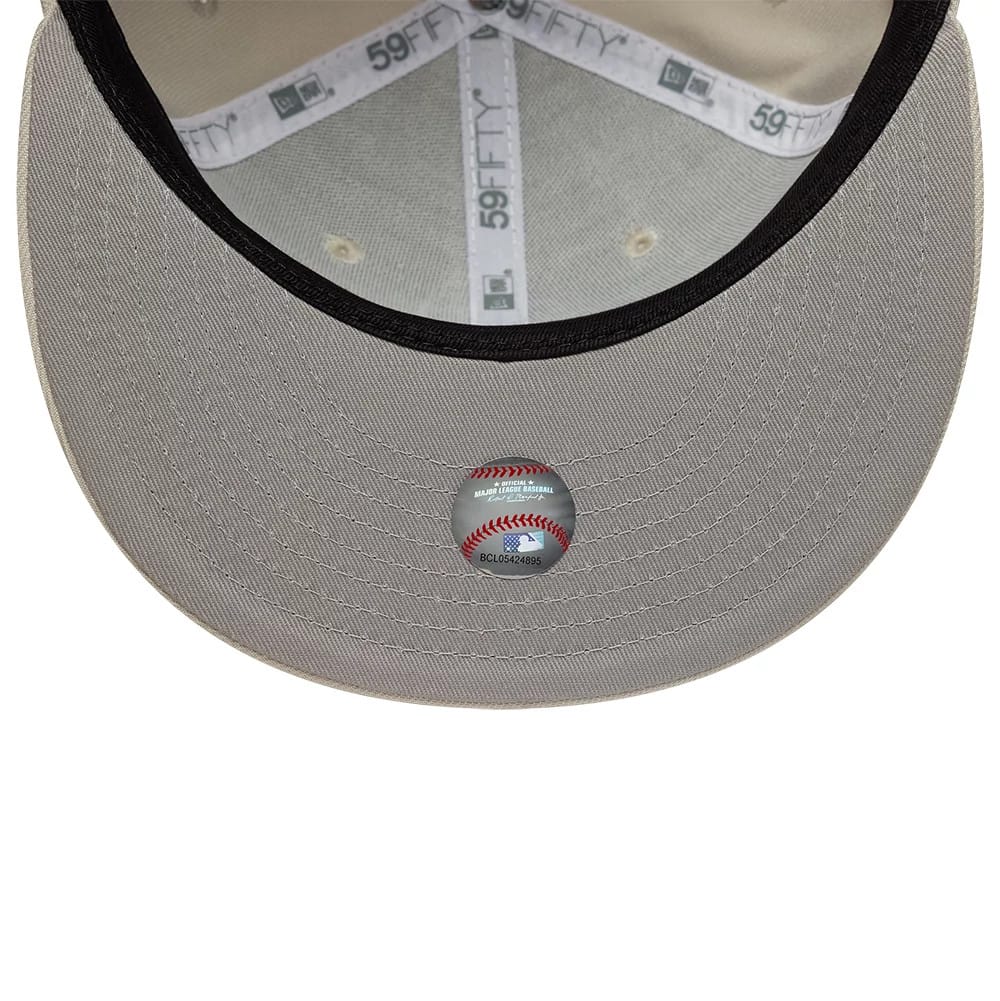 Pictured is this MLB Chicago White Sox 59FIFTY Fitted cap in beige. 2
