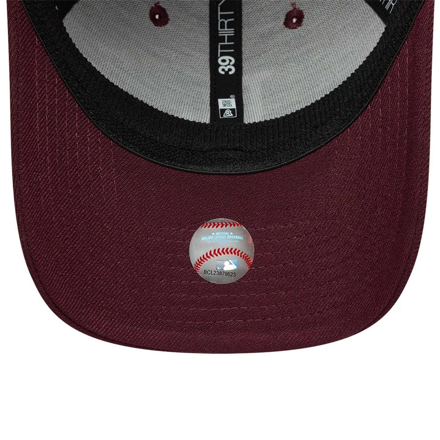LA Dodgers MLB Dark Purple New Era 39THIRTY Stretch Fit Cap, inside view showing the black sweatband with New Era branding, grey taping with 39THIRTY text, and a dark purple fabric undervisor with an MLB holographic sticker.