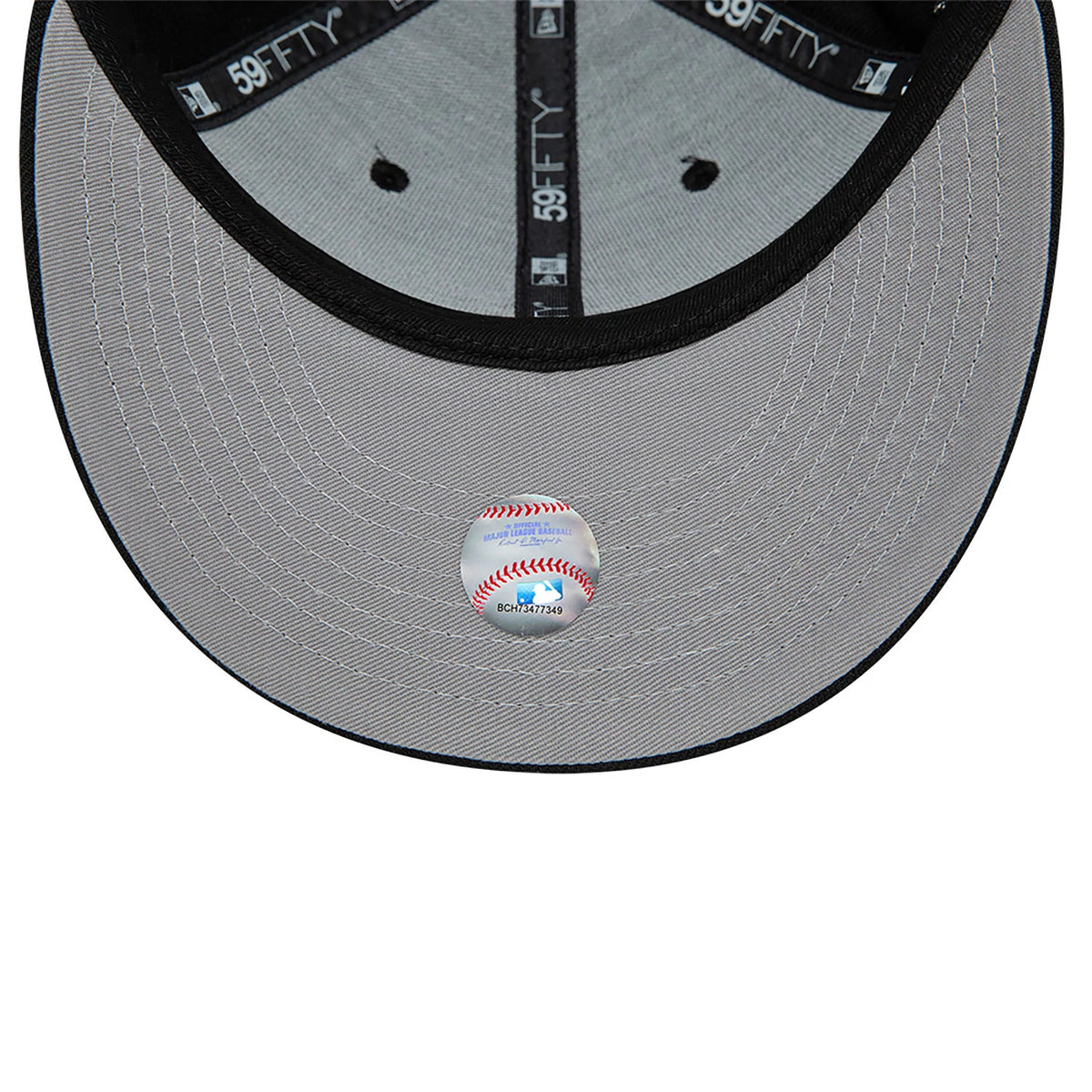 LA Dodgers MLB Black Low Profile New Era 59FIFTY Fitted Cap, inside view showing a grey undervisor with a round holographic sticker, black 59FIFTY taping along the seams, and eyelets on the inner crown.