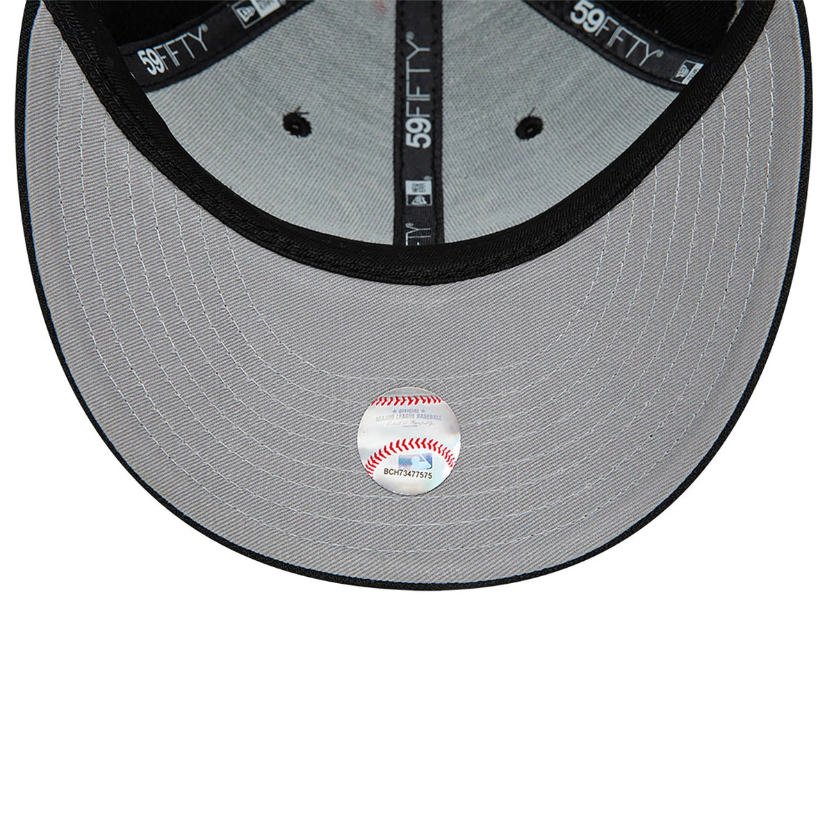 New York Yankees MLB Black Low Profile New Era 59FIFTY Fitted Cap, inside view showing the grey undervisor with a round authenticity sticker, black 59FIFTY taping along the seams, and a black sweatband lining the interior edge.