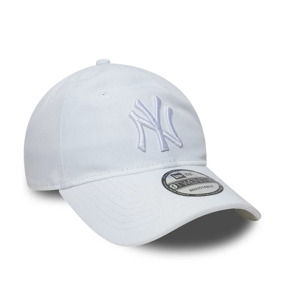 New York Yankees MLB White New Era 9TWENTY Adjustable Cap, three-quarter view showing the raised white embroidered NY logo on the front panel, curved white visor with a 9TWENTY size sticker, and white top button.