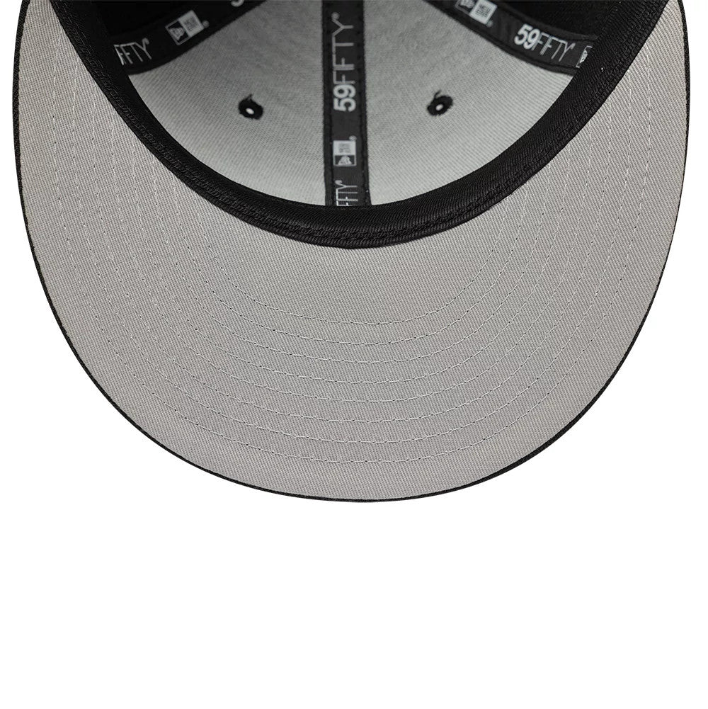 New Era Core Black Low Profile 59FIFTY Fitted Cap, inside view showing the black 59FIFTY branded taping and seams, grey undervisor with multiple rows of stitching, and the structured black sweatband, highlighting the detailed craftsmanship.