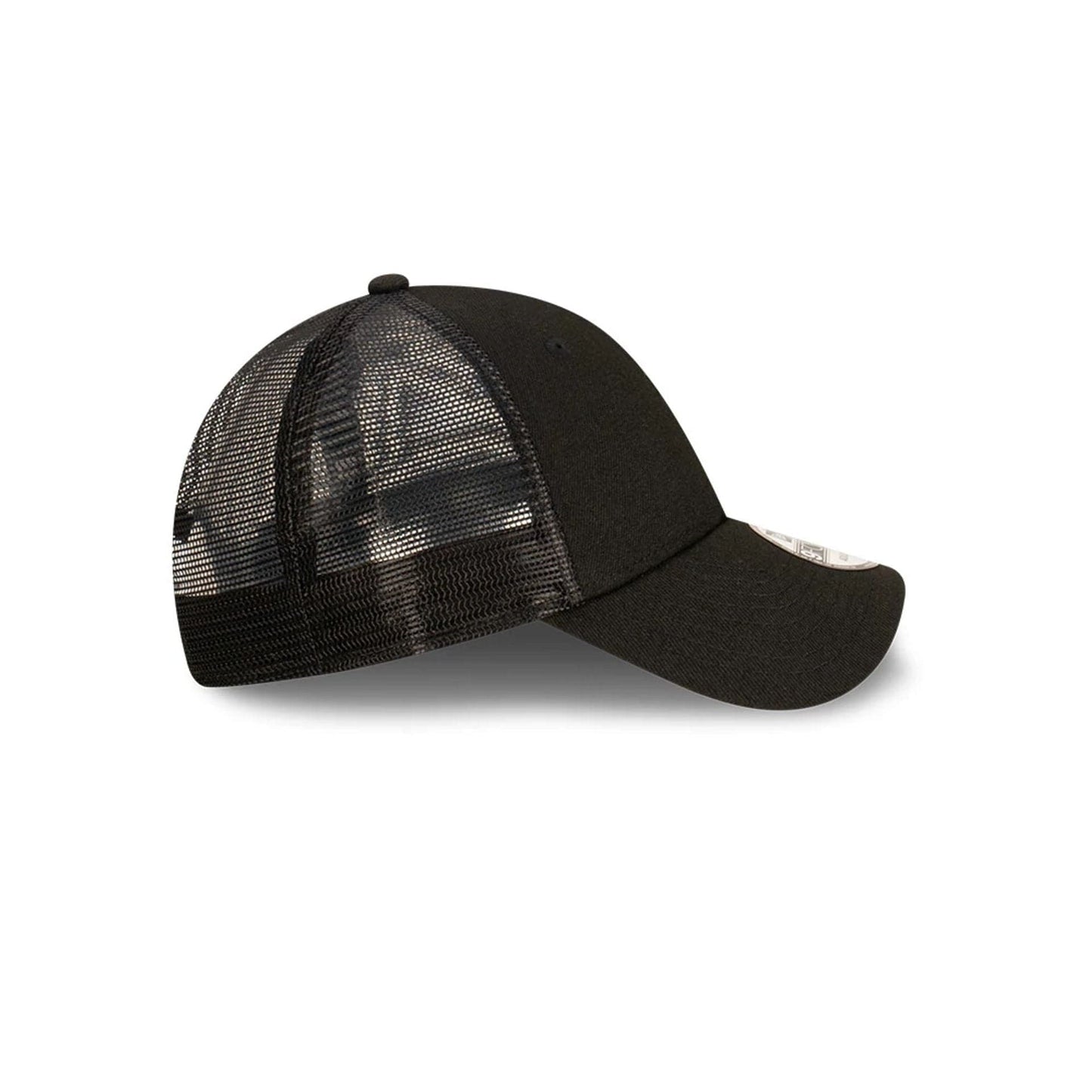 New Era Blank Black 9FORTY Trucker Cap, side view showing the curved black visor, black mesh back panels and a structured front crown, with the 9FORTY size sticker on the top of the visor.