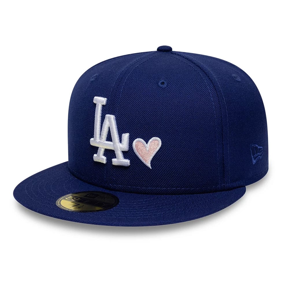 Pictured is this MLB Heart LA Dodgers 59FIFTY Fitted cap in dark blue. 1