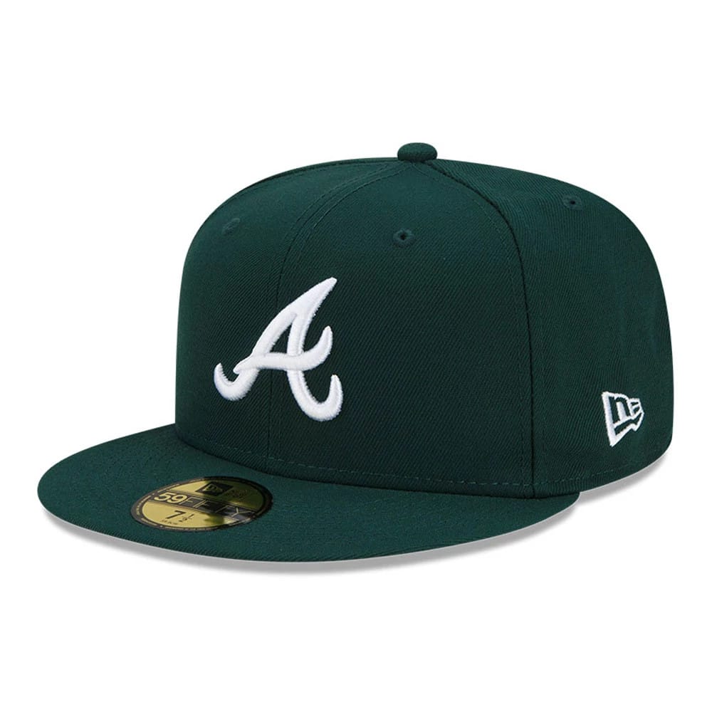 Atlanta Braves MLB Dark Green New Era 59FIFTY Fitted Cap, three-quarter view showing the raised white embroidered A on the front panel, with a matching dark green flat visor and a gold 59FIFTY size sticker on the visor.