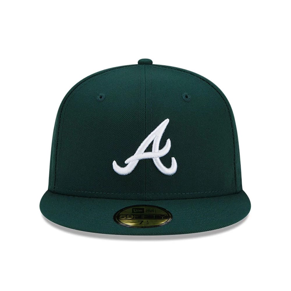 Atlanta Braves MLB Dark Green New Era 59FIFTY Fitted Cap, front view showing the raised white embroidered Atlanta Braves logo on the structured dark green crown, matching flat visor, and gold 59FIFTY size sticker on the visor.