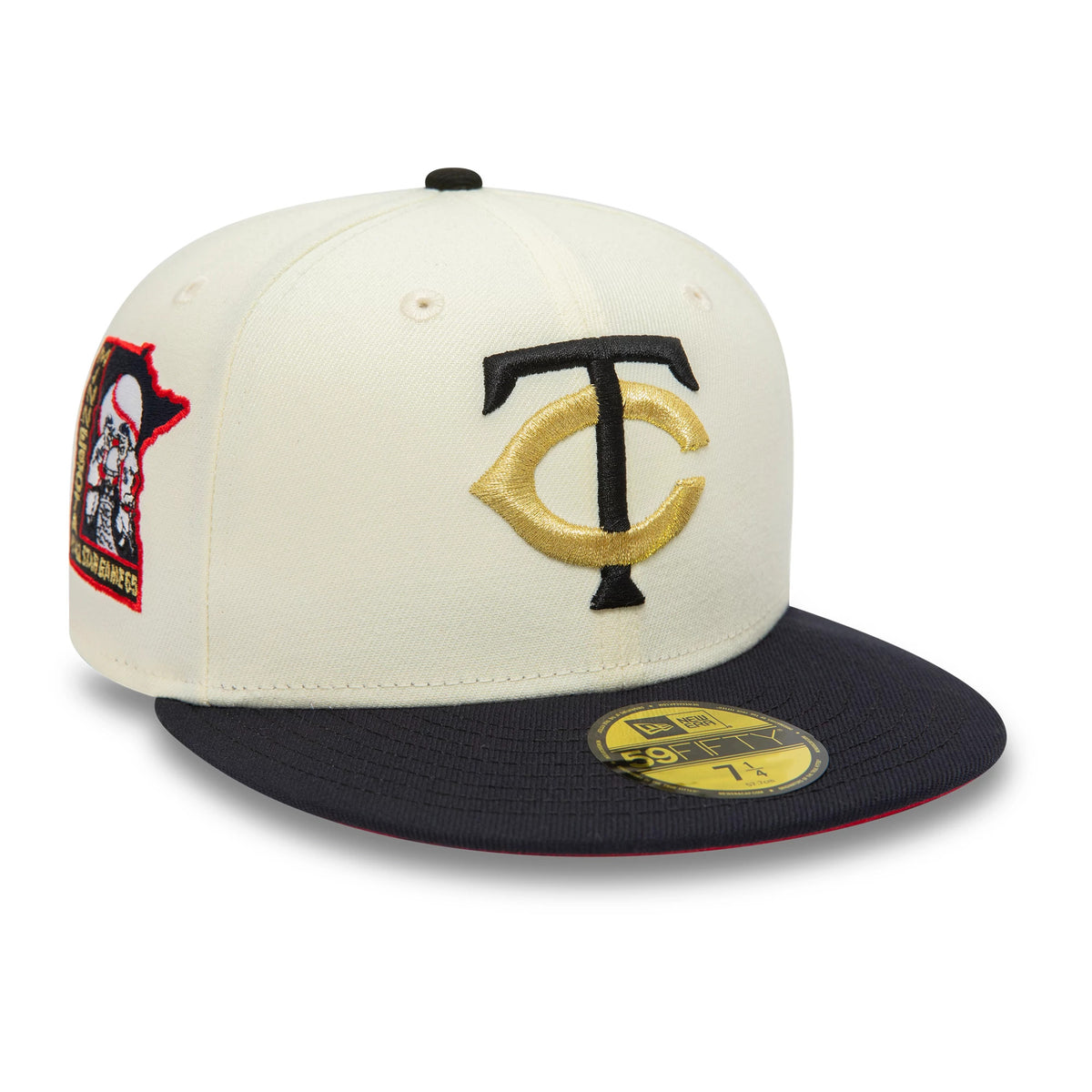 Minnesota Twins MLB White New Era 59FIFTY Fitted Cap, three-quarter view with a raised black and gold TC logo embroidered on the front panel, featuring a navy visor with a gold 59FIFTY size sticker and a celebratory side patch.