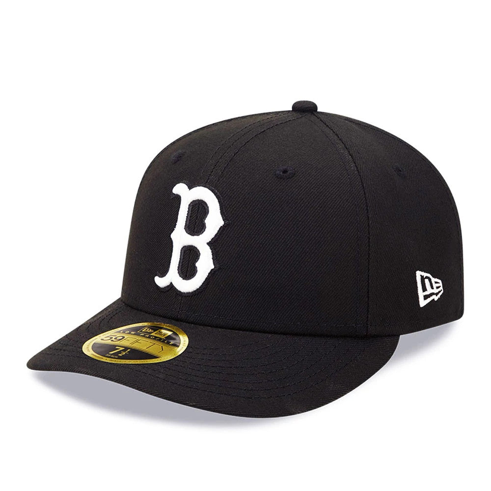 Boston Red Sox MLB Black Low Profile New Era 59FIFTY Fitted Cap, three-quarter view showing the white embroidered B logo on the front panel, the New Era flag logo on the left side, and a gold 59FIFTY size sticker on the curved black visor.