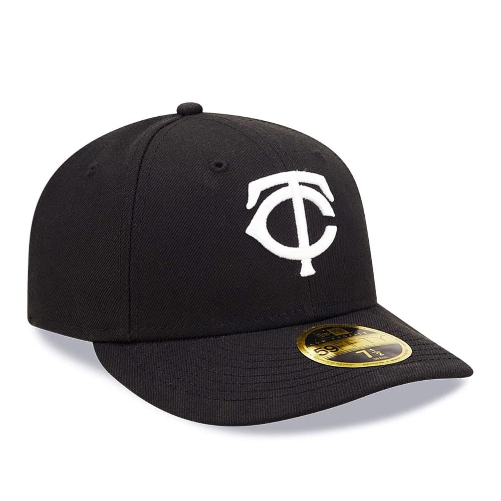 Minnesota Twins MLB Black Low Profile New Era 59FIFTY Fitted Cap, three-quarter view showing the white raised embroidered TC logo on the front panel, a black curved visor, and a gold 59FIFTY size sticker on the visor.