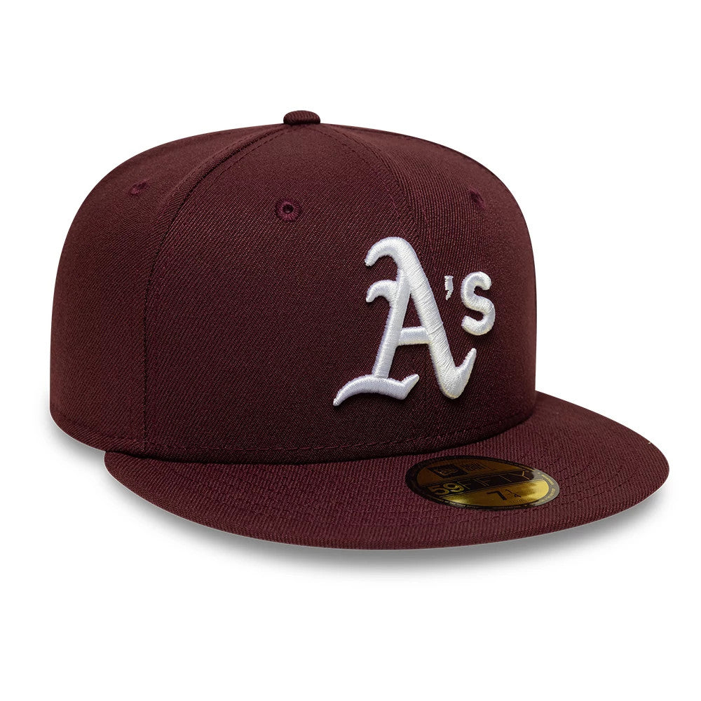 Athletics MLB Dark Purple New Era 59FIFTY Fitted Cap, front view showing the white embroidered A’s logo on the structured purple crown, with a matching flat visor and a gold 59FIFTY size sticker on the visor.