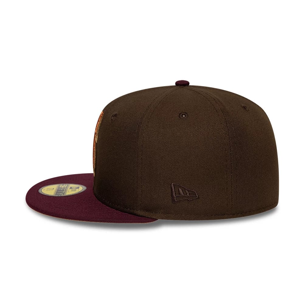 Seattle Mariners MLB Cooperstown Dark Brown New Era 59FIFTY Fitted Cap, side view showing the dark brown New Era flag logo embroidered on the left side, with a maroon flat visor and a gold 59FIFTY size sticker on the visor.