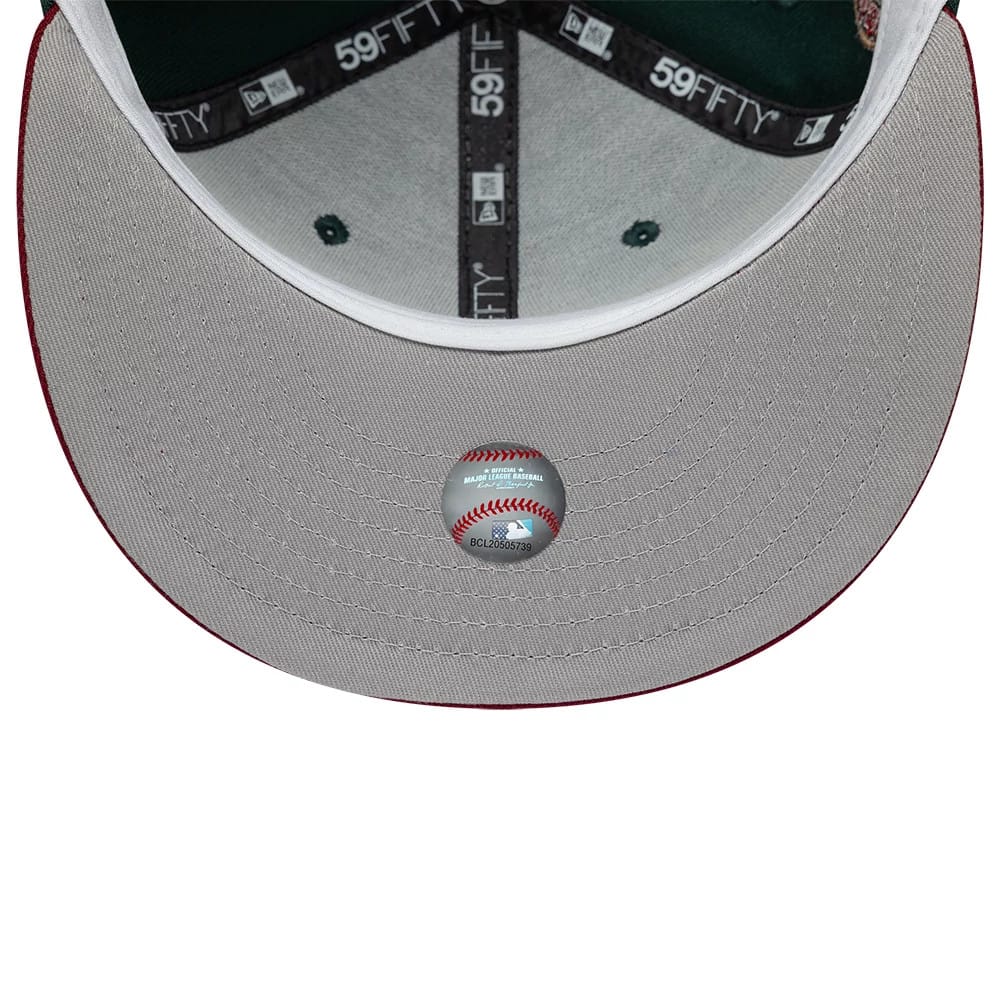 Pictured is this MLB Cooperstown Seattle Mariners 59FIFTY Fitted cap in dark green. 2