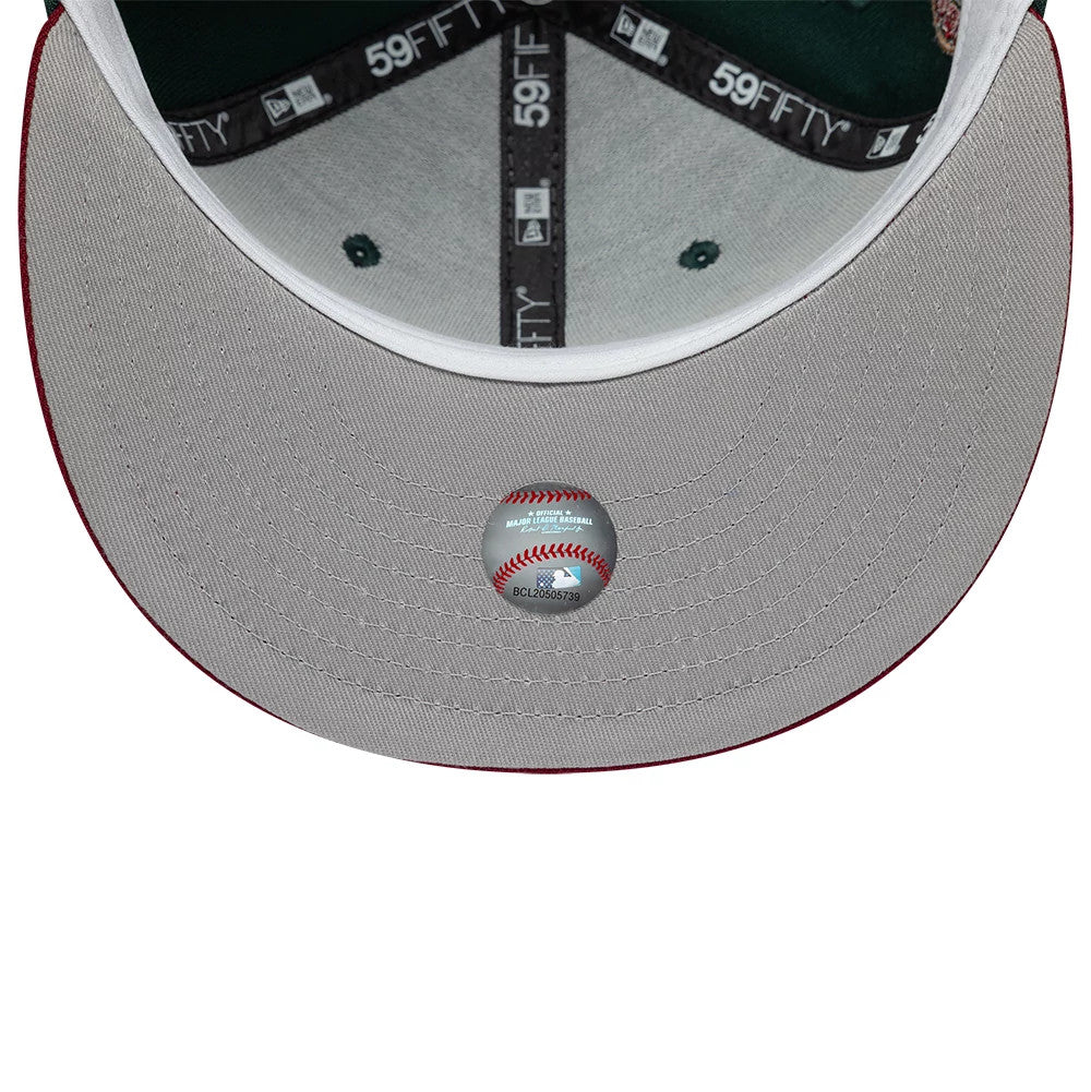 Pictured is this MLB Cooperstown Seattle Mariners 59FIFTY Fitted cap in dark green. 2
