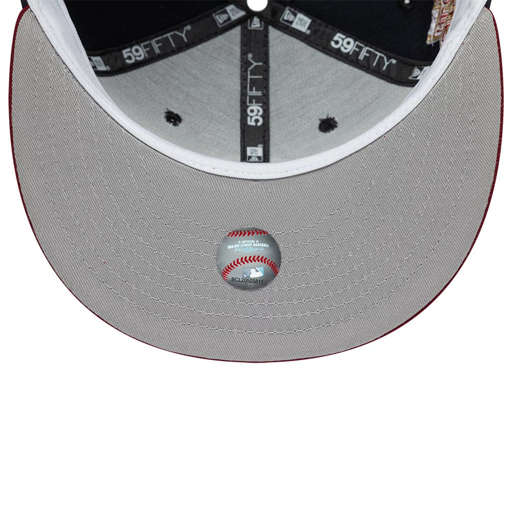 New York Yankees MLB Cooperstown Navy & Dark Red New Era 59FIFTY Fitted Cap, inside view showing the black branded 59FIFTY taping along the seams, a dark grey undervisor with intricate stitch and a holographic size sticker in the centre.