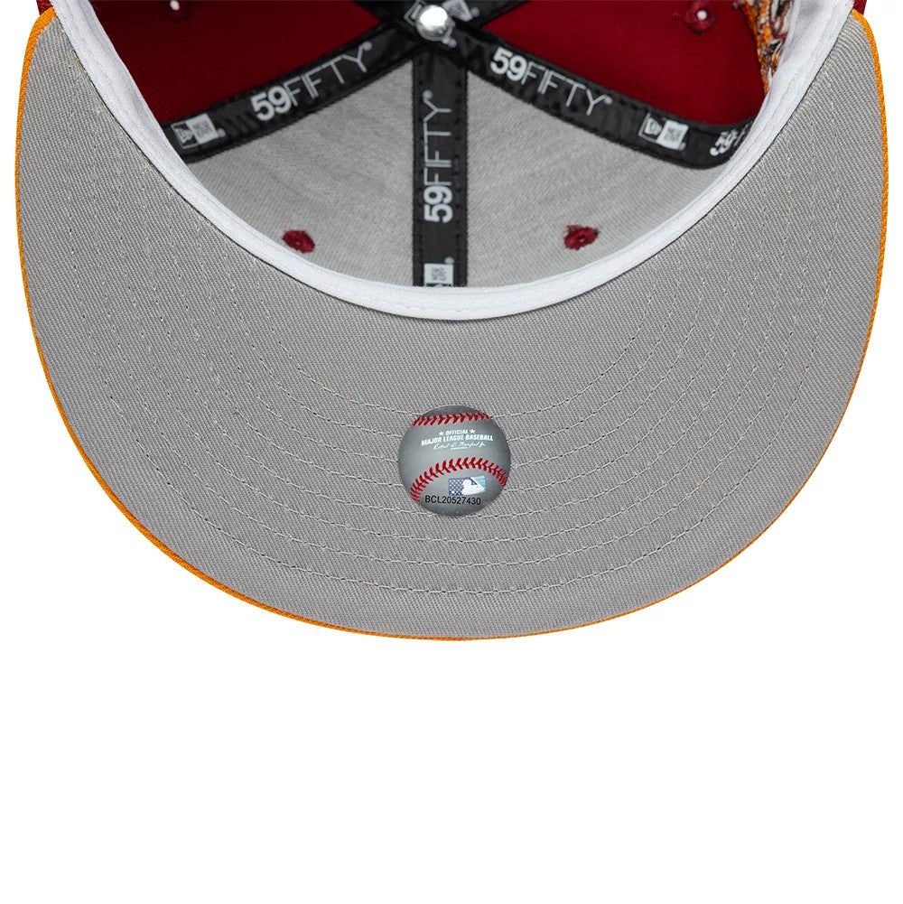 Houston Astros MLB Cooperstown Dark Red New Era 59FIFTY Fitted Cap, inside view showing a grey undervisor with a Major League Baseball sticker, dark red interior with embroidered eyelets, and black 59FIFTY branded taping on the seams.