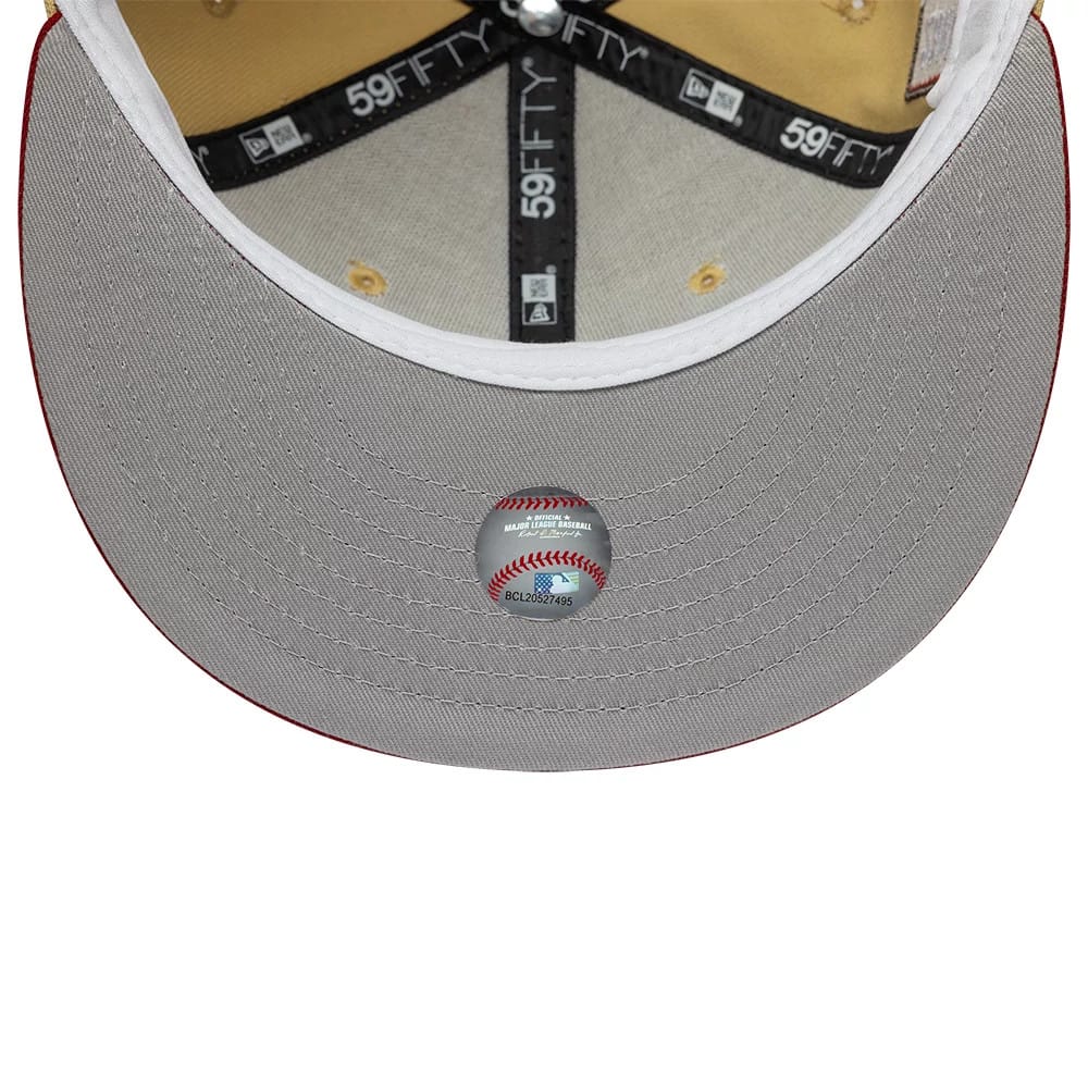 Houston Astros MLB Vegas Gold New Era 59FIFTY Fitted Cap, inside view showing black brand taping and New Era logos, white sweatband, and grey undervisor featuring an MLB baseball sticker in the centre.