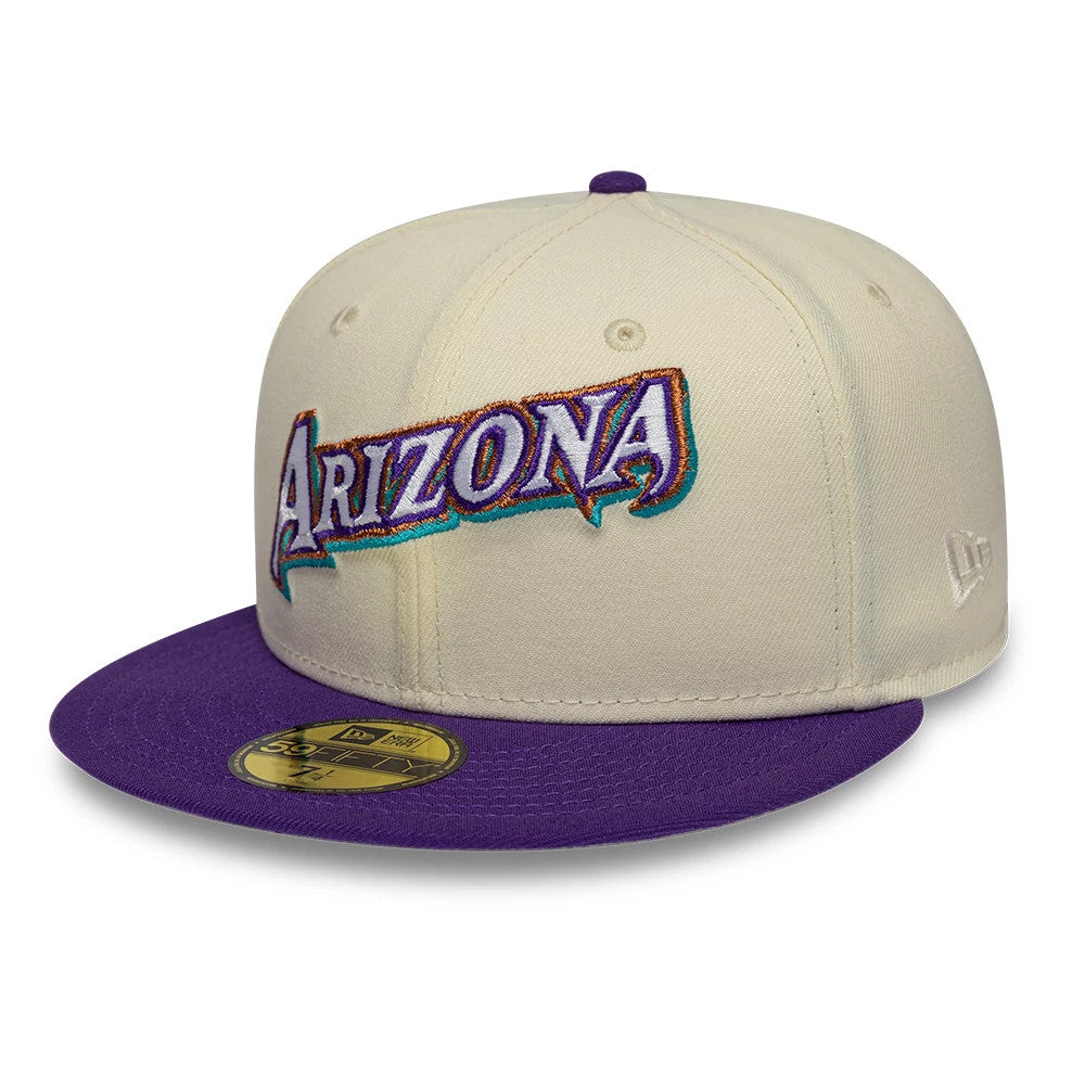 Arizona Diamondbacks MLB Cooperstown White New Era 59FIFTY Fitted Cap, three-quarter view showing the embroidered Arizona lettering on the structured white crown, complemented by a purple visor and top button, with a gold 59FIFTY size sticker.