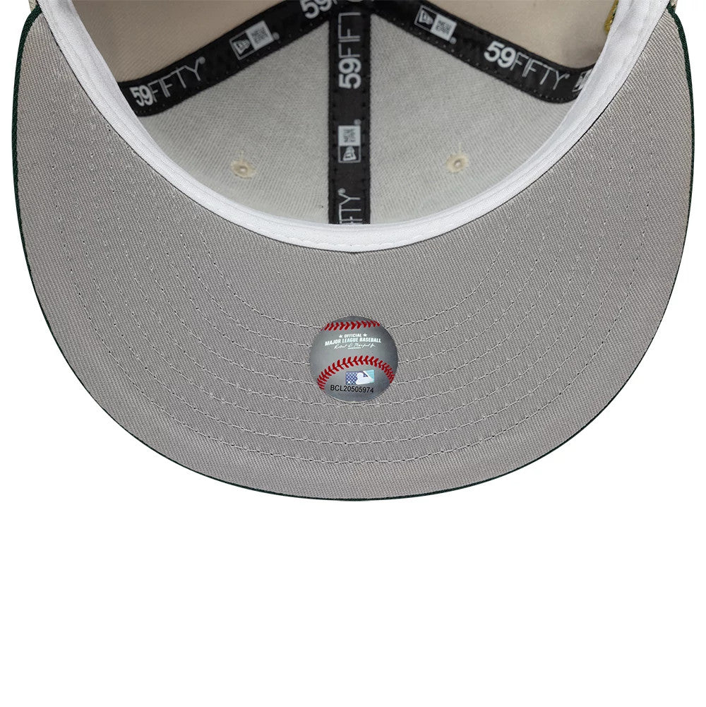 Houston Astros MLB Cooperstown Beige New Era 59FIFTY Fitted Cap, inside view showing the grey undervisor with a central MLB holographic sticker, white taping with black 59FIFTY branding, and a white sweatband.