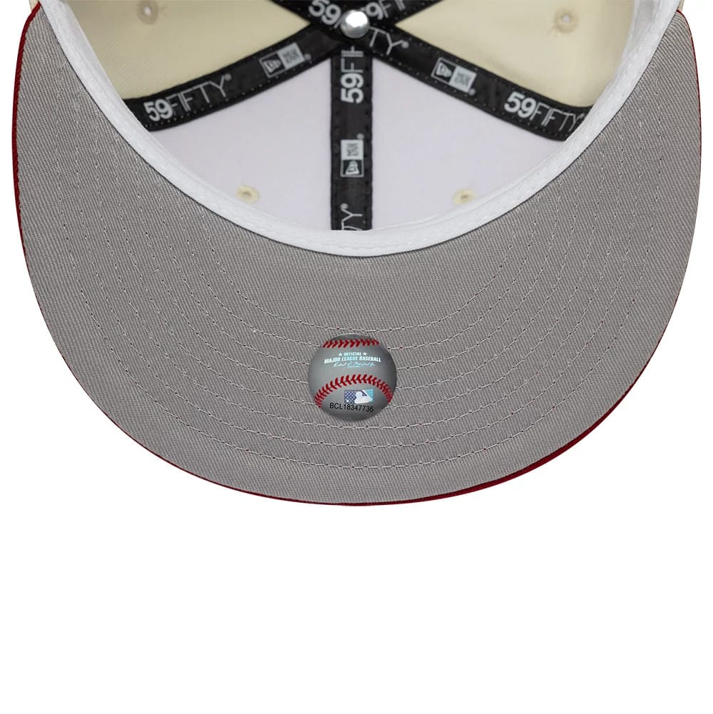 Arizona Diamondbacks MLB Cooperstown White New Era 59FIFTY Fitted Cap, inside view showing the grey undervisor with a baseball-themed sticker in the centre, black 59FIFTY taping, and a white sweatband around the crown.