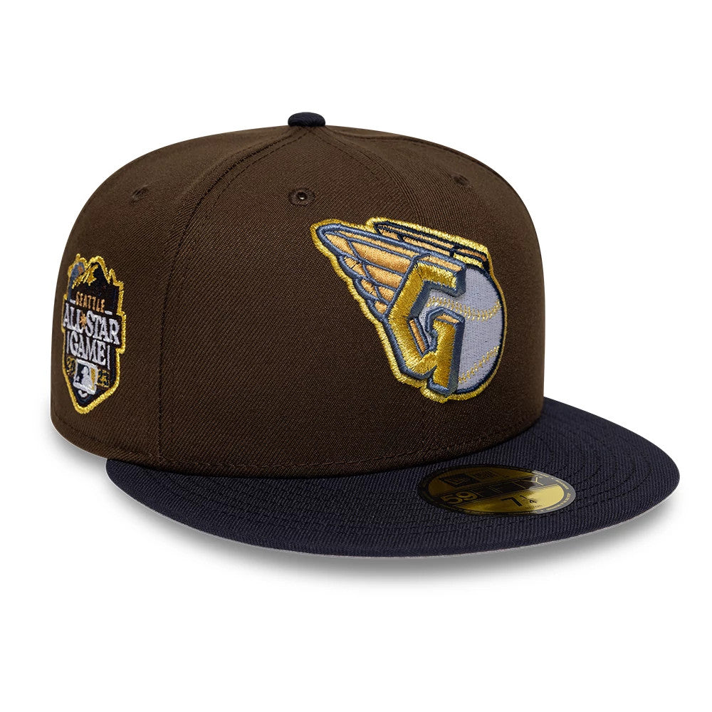 Pictured is this MLB Cooperstown Cleveland Guardians 59FIFTY Fitted cap in dark brown & navy. 1
