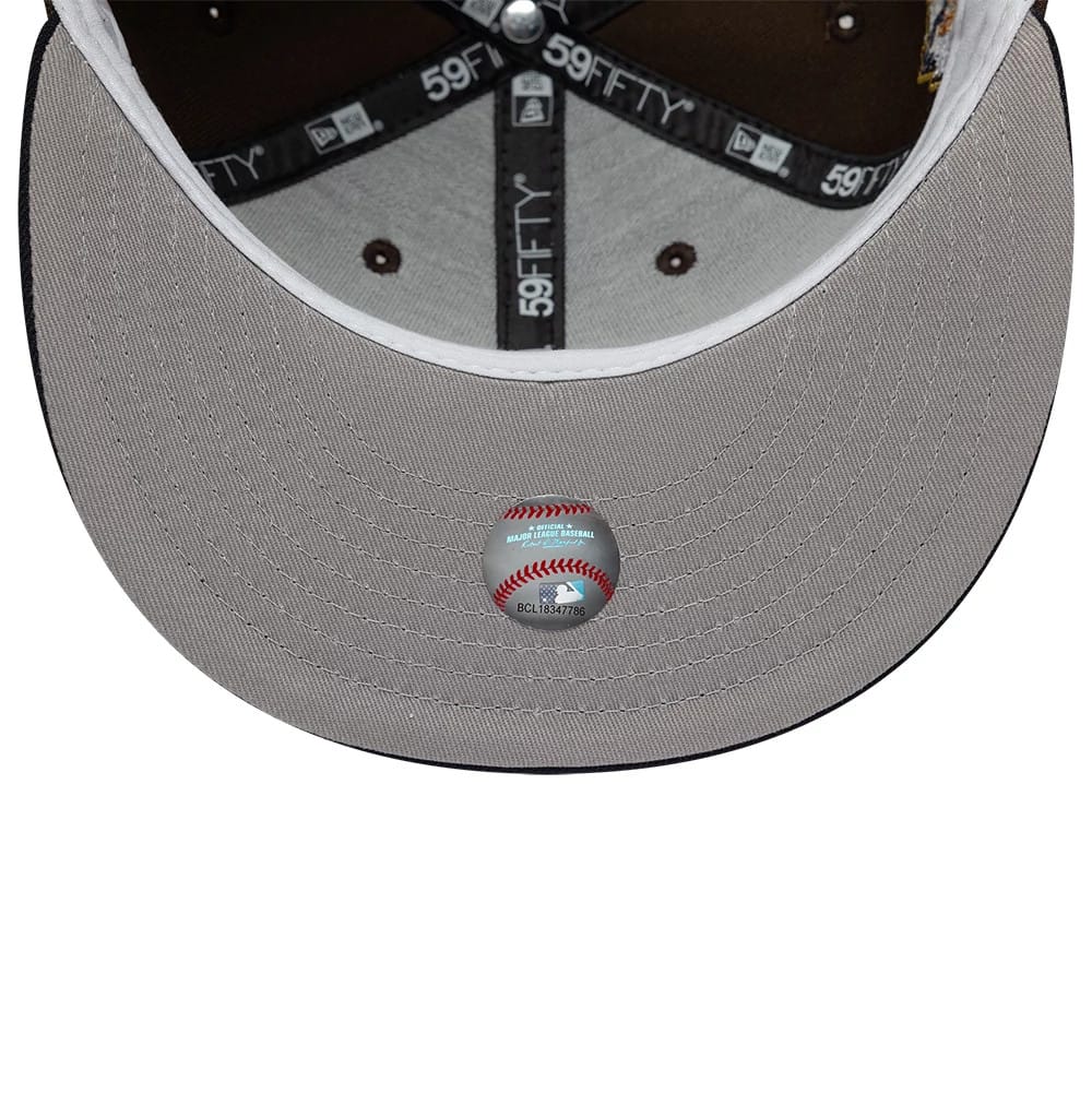 Pictured is this MLB Cooperstown Cleveland Guardians 59FIFTY Fitted cap in dark brown & navy. 2