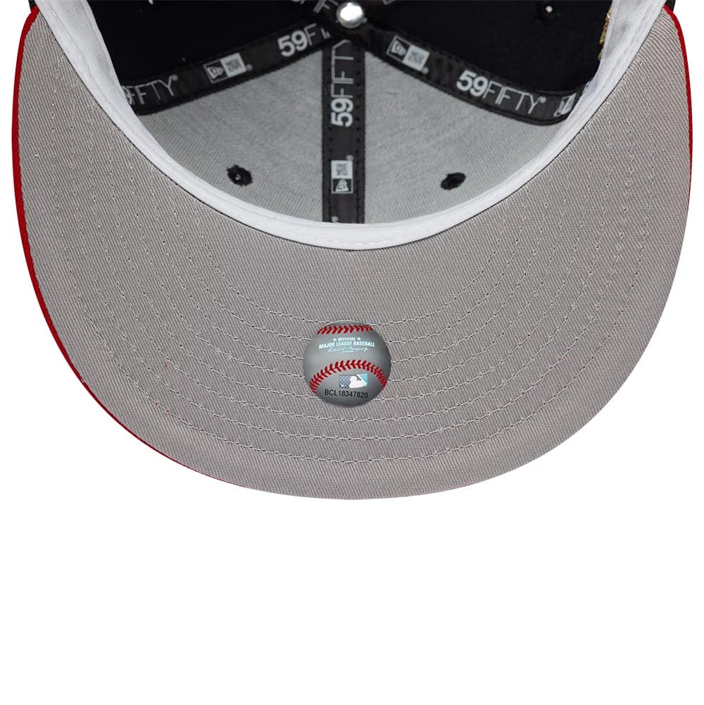 Boston Red Sox MLB Cooperstown Navy New Era 59FIFTY Fitted Cap, inside view showing grey undervisor with a detailed baseball sticker, black New Era taping with 59FIFTY branding, and a contrasting white sweatband lining the structured crown.