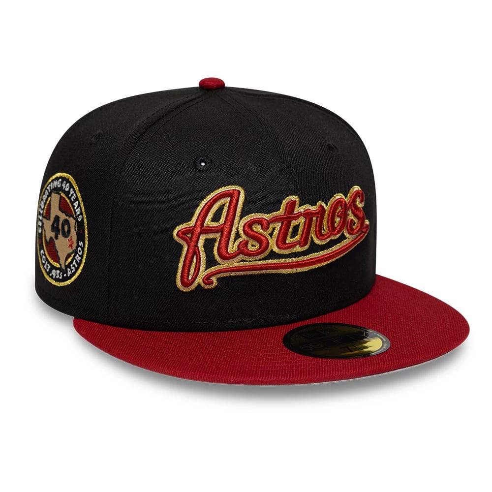 Houston Astros MLB Cooperstown Black & Red New Era 59FIFTY Fitted Cap, three-quarter view showing the raised gold and red embroidered Astros script on the front panel, red flat visor with a gold 59FIFTY size sticker, and celebratory side patch.