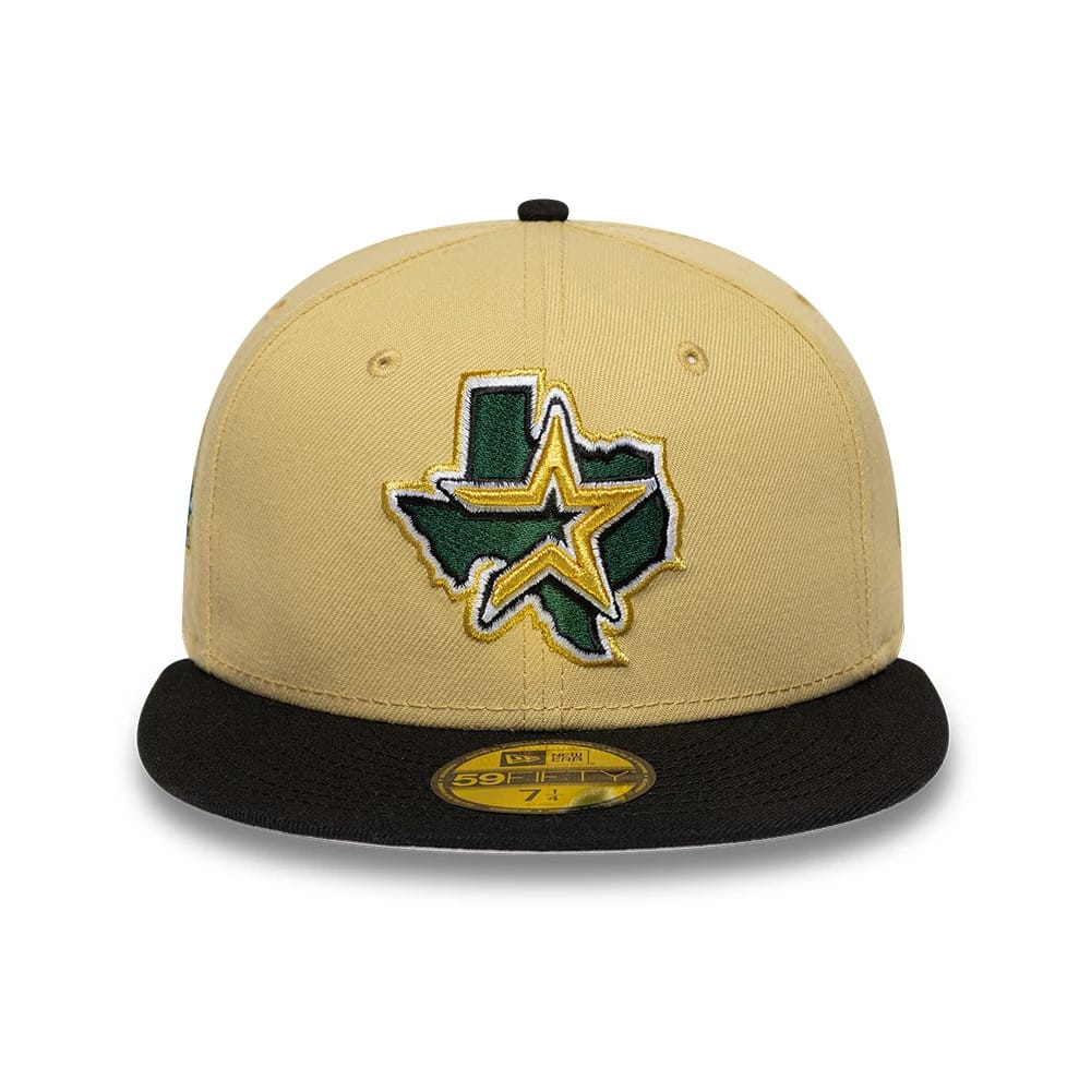 Houston Astros MLB Vegas Gold & Black New Era 59FIFTY Fitted Cap, front view showing a raised green and yellow Texas star logo embroidered on the vegas gold crown, with a contrasting black flat visor and a gold 59FIFTY size sticker on top.