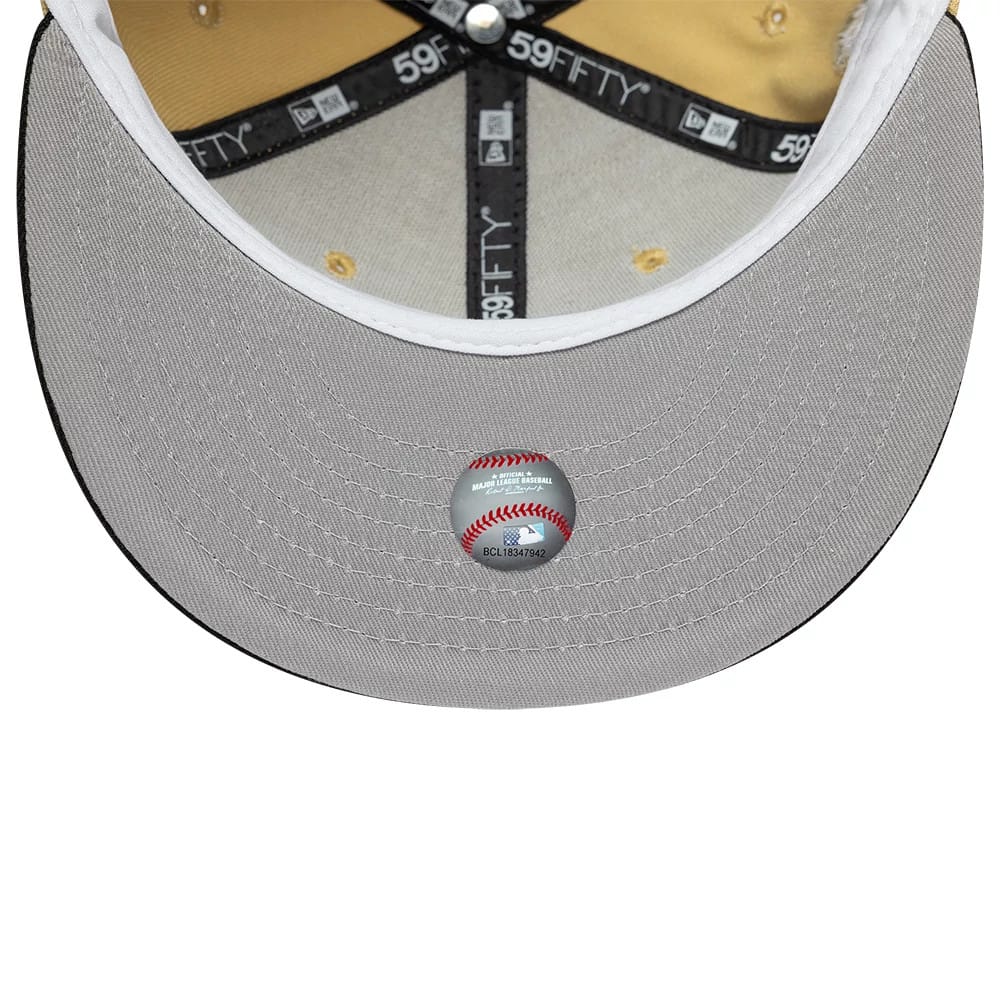 Houston Astros MLB Vegas Gold & Black New Era 59FIFTY Fitted Cap, inside view showing a gold sweatband, black branded taping across the crown, and a grey undervisor with a baseball-themed authenticity sticker at the centre.