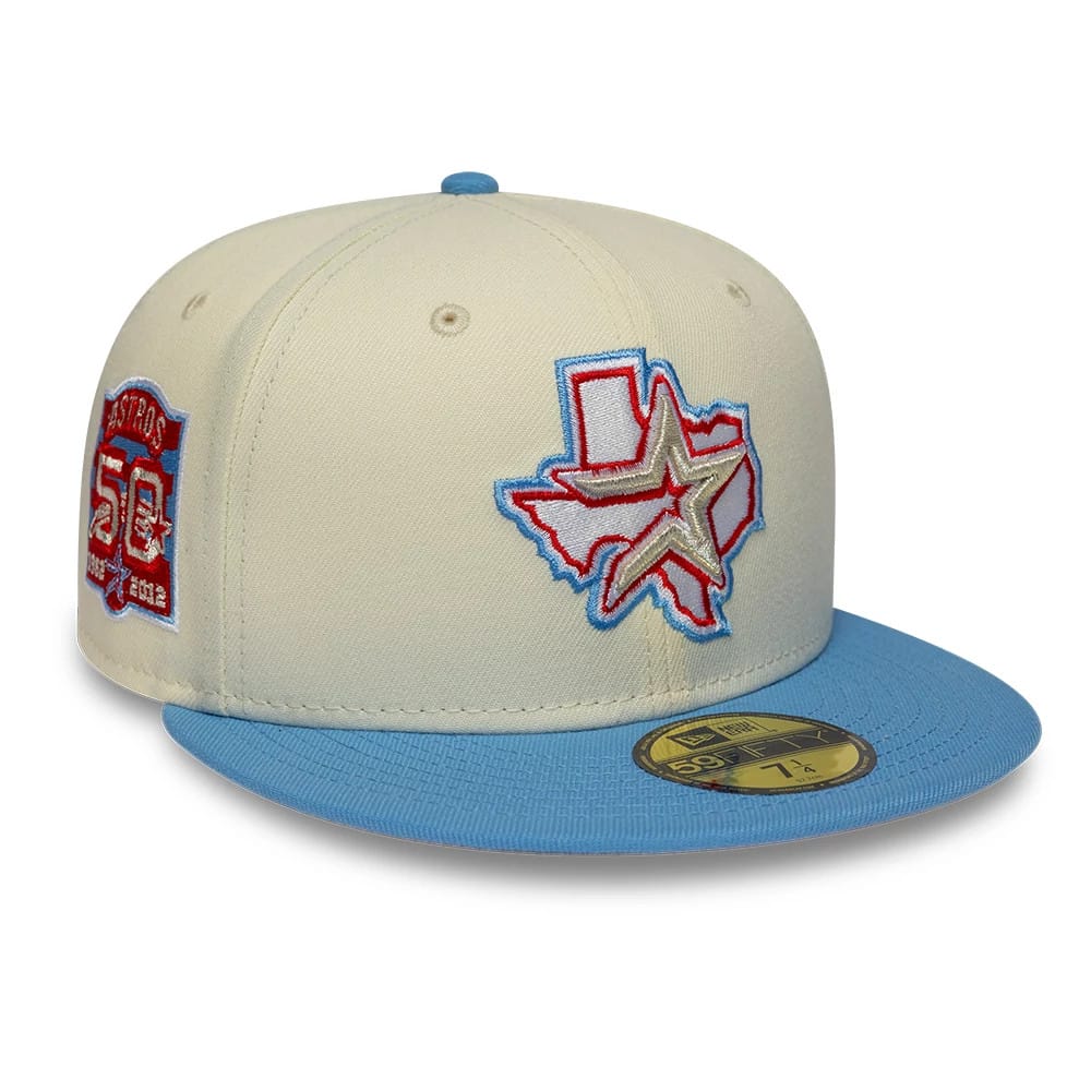 Houston Astros MLB Cooperstown Cream New Era 59FIFTY Fitted Cap, three-quarter view showing a red and blue embroidered Texas logo with a star on the front panel, golden 59FIFTY size sticker on the flat blue visor, red and blue patch on the side.